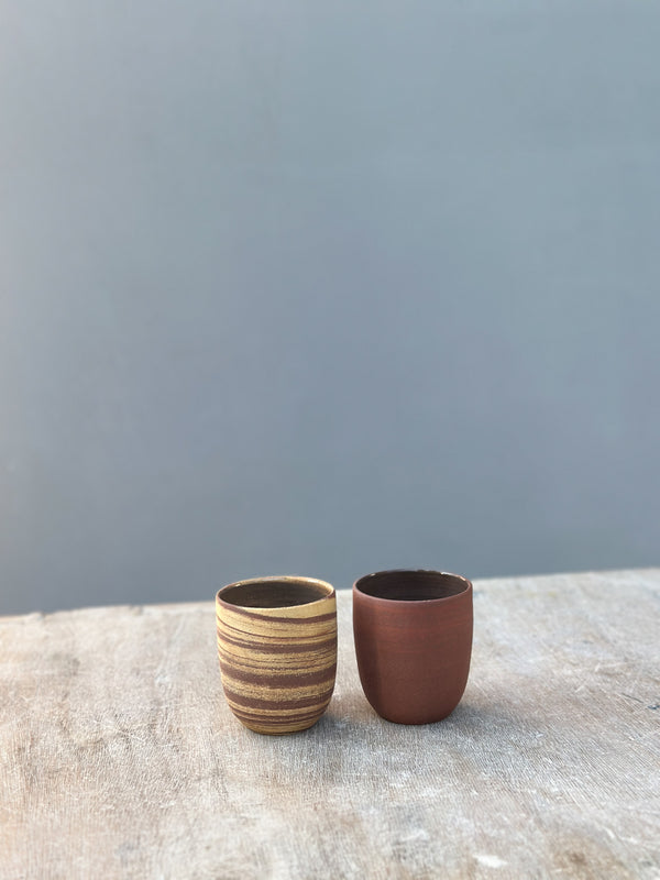 agateware cups in autumn colours red and yellow clay