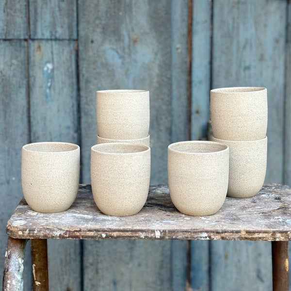 cups made of speckled stoneware clay
