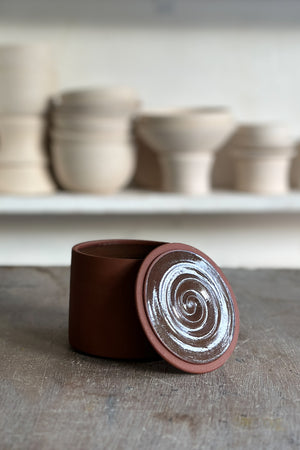 red clay lidded jars