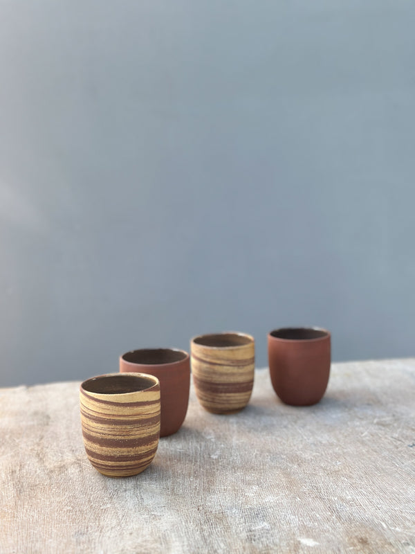 neriage cups with warm colors like a red and yellow clay mix