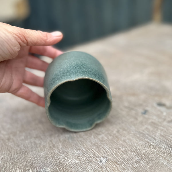 ceramic cups in teal