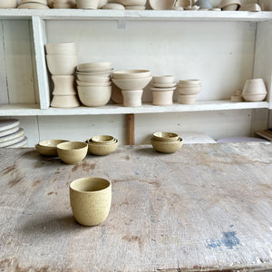yellow speckled clay cups