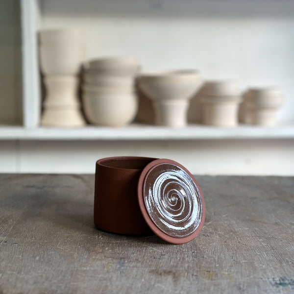 red clay lidded jars