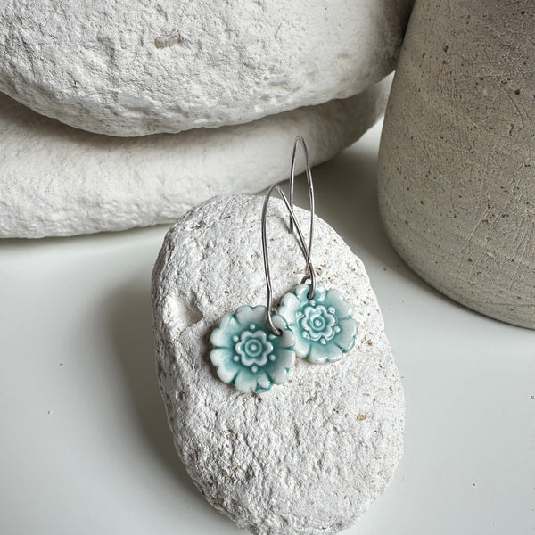 Earring - Porcelain - Fleur Du Joly on long earwires in white and jade green.