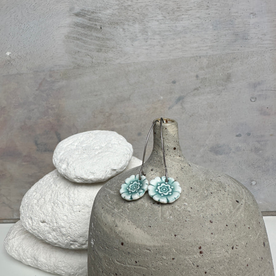 Earring - Porcelain - Fleur Du Joly on long earwires in white and jade green.