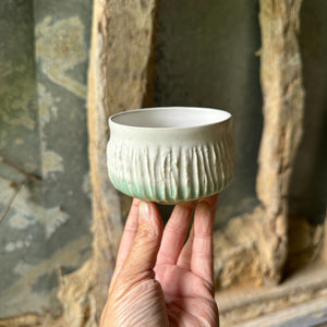 Handmade Chawan - Gloss white glaze and a bit of green over texture.