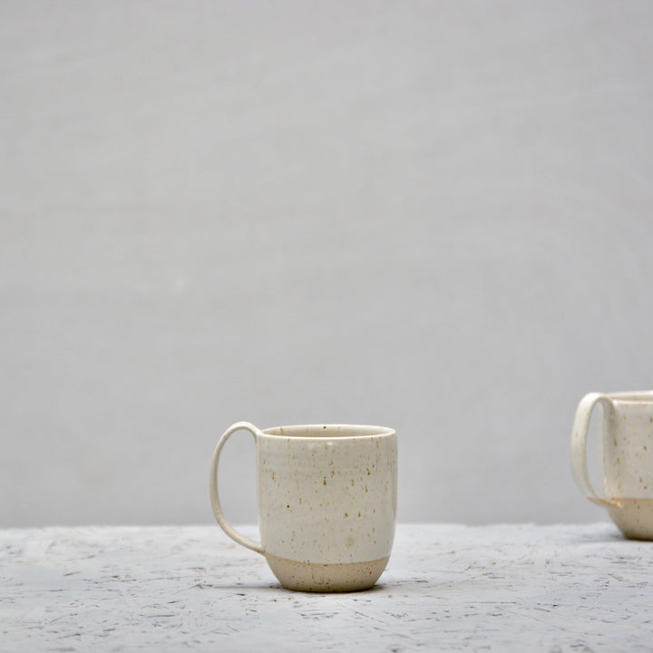We've Spotted You - Cafe lungo with handle - White gloss and a bit of naked speckled clay.